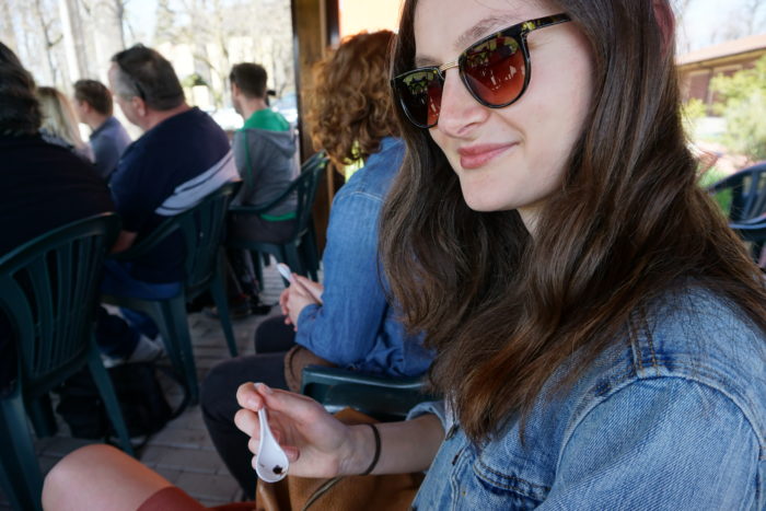 Maggie sampling traditional balsamic vinegar in Modena, Italy