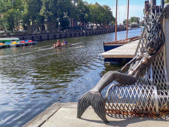 A mermaid basks in the sunshine on Klaipeda's riverfront