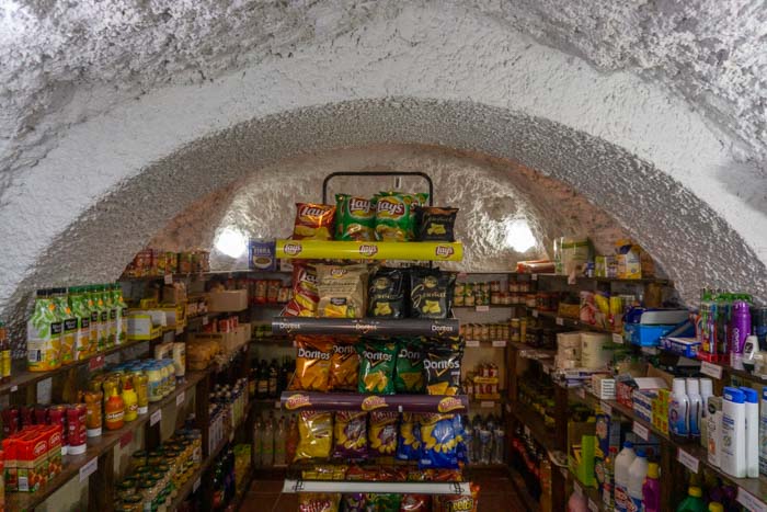 A traditional Sacromonte cave dwelling turned into a small supermarket
