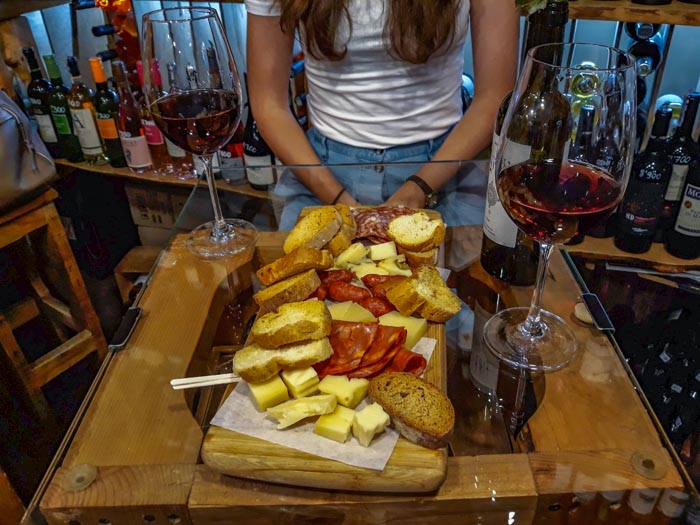 A glass of local red and a meat a cheese board from In Vino in Yerevan
