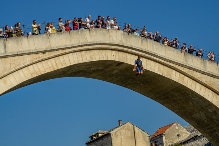 Divers jumping from Stari Most
