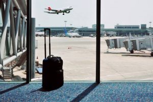 Waiting for your flight with your carry on luggage